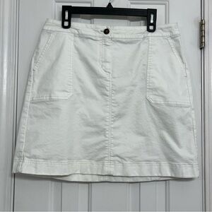 Boden white cotton zip button 2 pocket mini skirt, size 10 US.